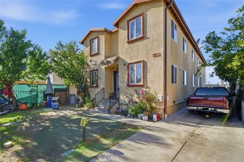 Photo of 3833 - 3835 Woodlawn Ave, Los Angeles, CA 90011 (MLS # PW25279485)