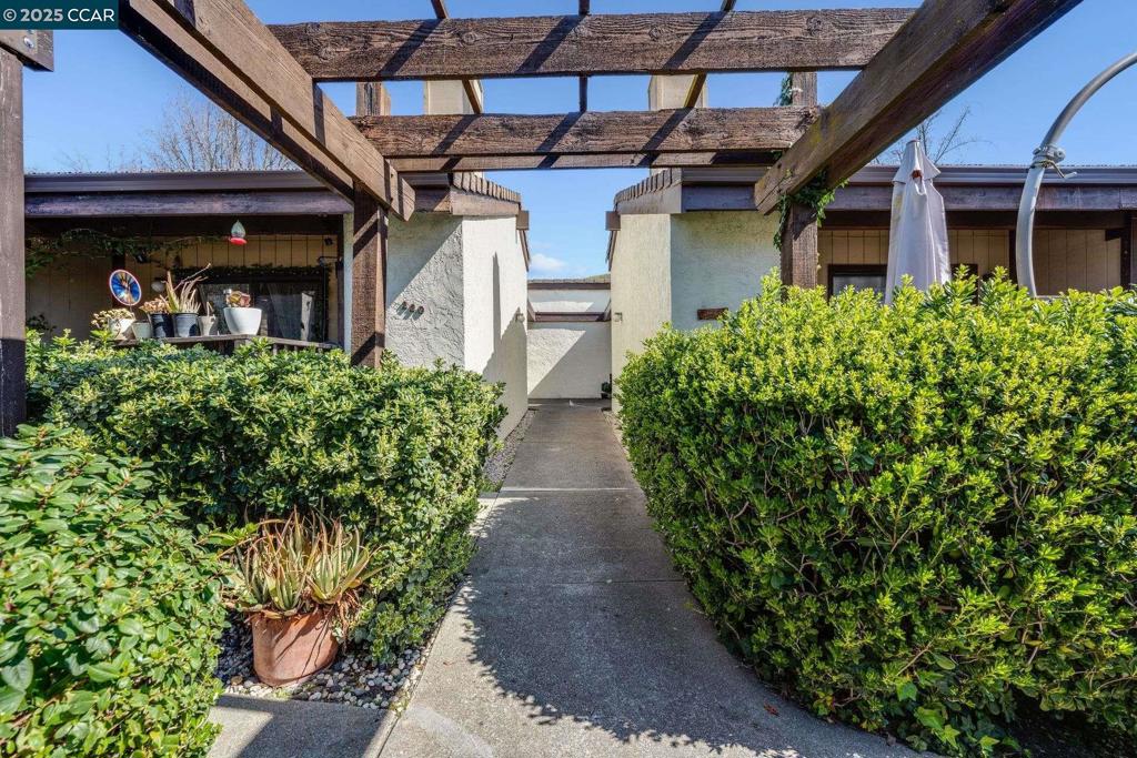 This beautifully updated, one-story, duet-style condo is located in the highly sought-after Sunny Glen, an over-55 community. The open floor plan showcases a gourmet kitchen with shaker-style cabinets, stainless steel appliances, custom subway tile backsplash, recessed lighting, and elegant quartz countertops. The spacious living room boasts cathedral ceilings and fireplace. The primary bathroom features a walk-in tile shower and a free-standing vanity with a marble countertop. The second bedroom offers vaulted ceilings and a generously sized closet. The updated hall bathroom includes a shower over the tub. Throughout the home, luxury vinyl flooring adds a modern touch, and there are two private decks for outdoor enjoyment. Inside laundry, detached garage. Just a short distance to shopping, golf, parks, and the Sunny Glen community pool and clubhouse, offering a wealth of amenities for a vibrant lifestyle.