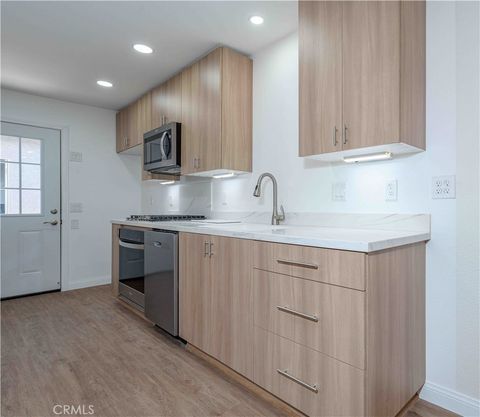 Photo of 10419 Hayford Street #J, Bellflower, CA 90706 (MLS # OC26127061)