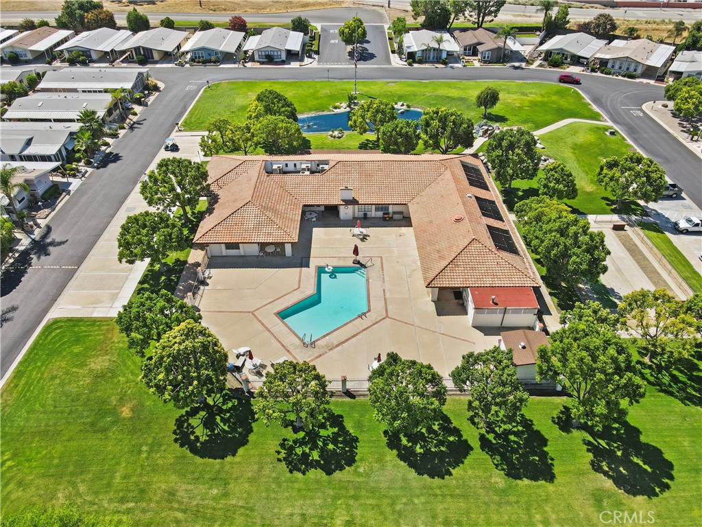 Welcome to Mountain View Estates, a highly desirable 55+ community with stunning views of the San Jacinto Mountains and a serene park-like setting.
Step inside to a spacious living and dining area featuring a built-in lighted hutch. The kitchen comes equipped with a refrigerator, dishwasher, gas stove, and breakfast bar, and opens seamlessly to the family room with a sliding glass door leading to the full-length covered patio—perfect for relaxing or entertaining.
The primary suite is conveniently located off the living room and offers dual wardrobe closets, a ceiling fan, and a private bathroom with a vanity sink, garden soaking tub, and separate shower. A comfortable guest bedroom and guest bath with step-in shower provide ideal accommodations for visitors.
Additional highlights include:Indoor laundry room with washer & dryer included and direct access to the covered carport
Newer carpeting, freshly painted kitchen, laundry, and bathroom cabinets
Laminate wood and sheet vinyl flooring throughout
Large storage shed upgraded with electricity and lighting
Mountain View Estates offers resort-style amenities including a pool, spa, and a clubhouse with recreational activities and frequent social gatherings—all just steps from your door.