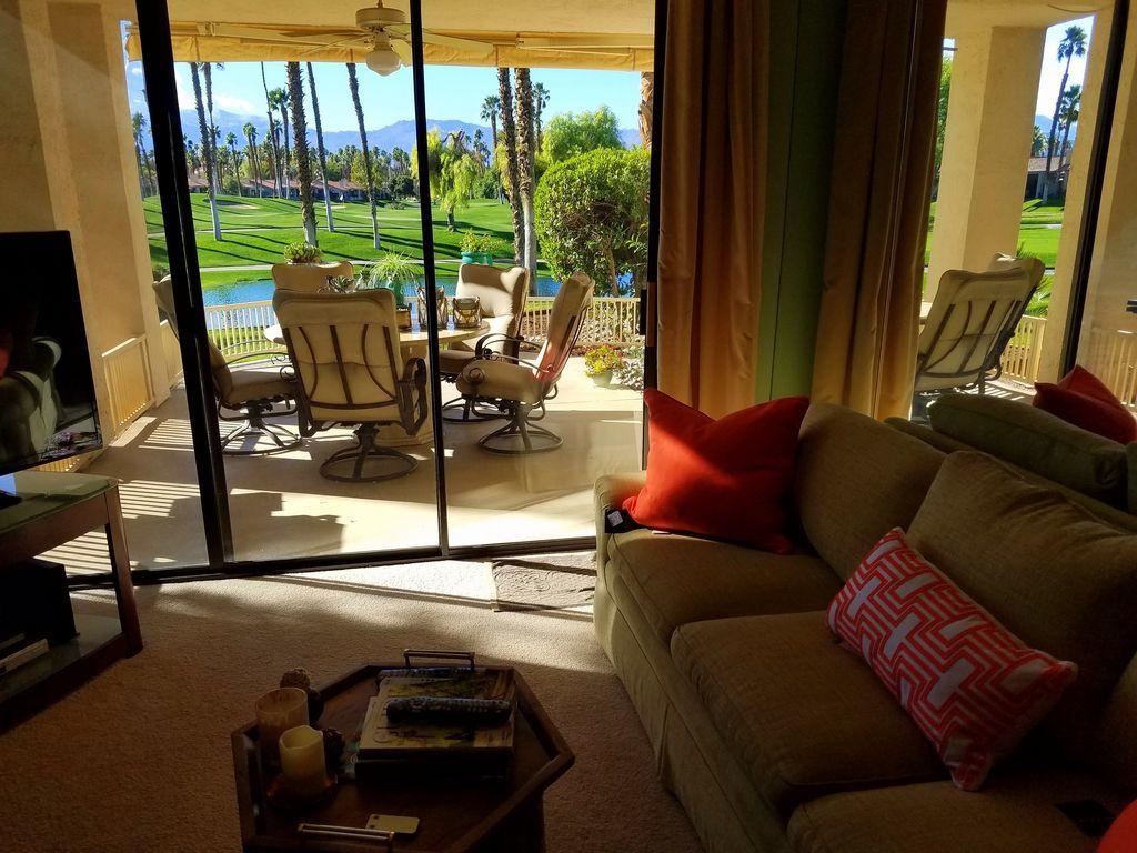 Rare Opportunity! Amazing Cash Cow! High Gross Rental Income (from May 2017 – April 2018) Rarest of all Views! Truly Spectacular, Million Dollar Golf Course View unit looking out Southwest over the Lake and Waterfalls, thru the small grassy knolls and hundreds of mature, towering palm trees, over the 17th green and looking directly into the breathtaking, snow capped San Jacinto mountains. Our lakefront villa is a 2 Bedroom, 2 Bath, Turn-Key, End Unit condo with approx. 1,312 sq. ft! Rare Opportunity! Amazing Cash Cow! $45,369 Gross Rental Income (from May 2017 – April 2018) Rarest of all Views! Truly Spectacular, Million Dollar Golf Course View unit looking out Southwest over the Lake and Waterfalls, thru the small grassy knolls and hundreds of mature, towering palm trees, over the 17th green and looking directly into the breathtaking, snow capped San Jacinto mountains!!! Our Sunny, Tastefully Decorated, Southwestern facing Spectacular Lake Front Villa at the Palm Valley Country Club (Palm Desert, Ca.) is a 2 Bedroom, 2 Bath, Turn-Key, End Unit condo with approx. 1,312 sq. ft. Our unit is all on one level with no stairs to climb and direct access through the 2 car garage into the house. The floor plan is very open, light and bright & inviting, yet, the bedrooms are on the opposite sides of the house, creating a lot of privacy, as well. This unit can be purchased fully designer furnished for $5,000.00 more than the final,negotiated price or it can be purchased unfurnished. Please see the list of furnishings, items that are available to be sold. Enjoy outdoor living at its finest with our unusually large, outdoor patio overlooking the Lake, Golf Course and Mountains, complete with built in gas barbeque, and a delightfully comfortable, high end, Mallin patio set with swivel rockers and an elegant all Marble table (If you decide to purchase furnished, of course). At the end of our covered patio, we have really nice power retractable awning. It's wonderfully nice b...