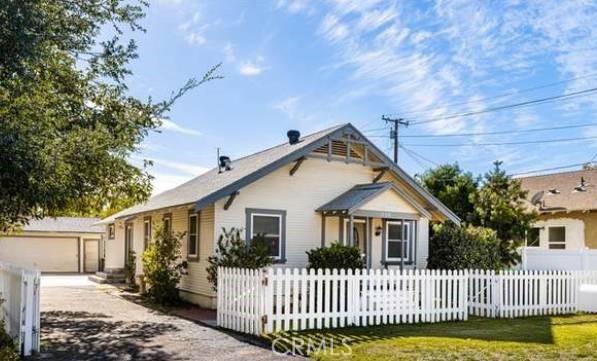 Here's your chance to live in the highly desirable Old Town Tustin! This charming, unfurnished craftsman cottage features 2 bedrooms and 1 bath and has been beautifully remodeled while retaining its original period details. The interior boasts a spacious living area with newer flooring throughout. The bathroom includes double sinks and a freshly glazed original claw-foot tub. The kitchen is equipped with granite countertops and ample storage. Additional features include A/C, forced-air heating, a Jack and Jill bathroom, and a roomy walk-in closet. Located in the heart of Old Town, you’re just a 5-minute walk from Peppertree Park and downtown, and a 5-minute drive to both the 5 and 55 freeways. For those with electric vehicles, there's a Level 2 charging station on-site.