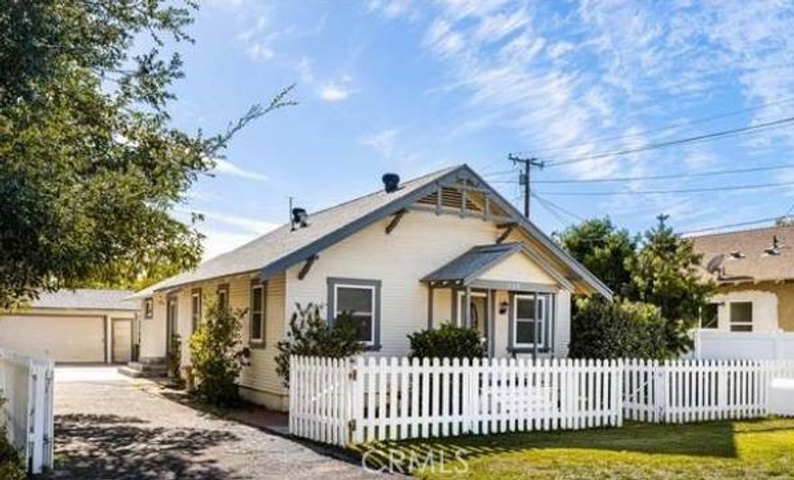Here's your chance to live in the highly desirable Old Town Tustin! This charming, unfurnished craftsman cottage features 2 bedrooms and 1 bath and has been beautifully remodeled while retaining its original period details. The interior boasts a spacious living area with newer flooring throughout. The bathroom includes double sinks and a freshly glazed original claw-foot tub. The kitchen is equipped with granite countertops and ample storage. Additional features include A/C, forced-air heating, a Jack and Jill bathroom, and a roomy walk-in closet. Located in the heart of Old Town, you’re just a 5-minute walk from Peppertree Park and downtown, and a 5-minute drive to both the 5 and 55 freeways. For those with electric vehicles, there's a Level 2 charging station on-site.