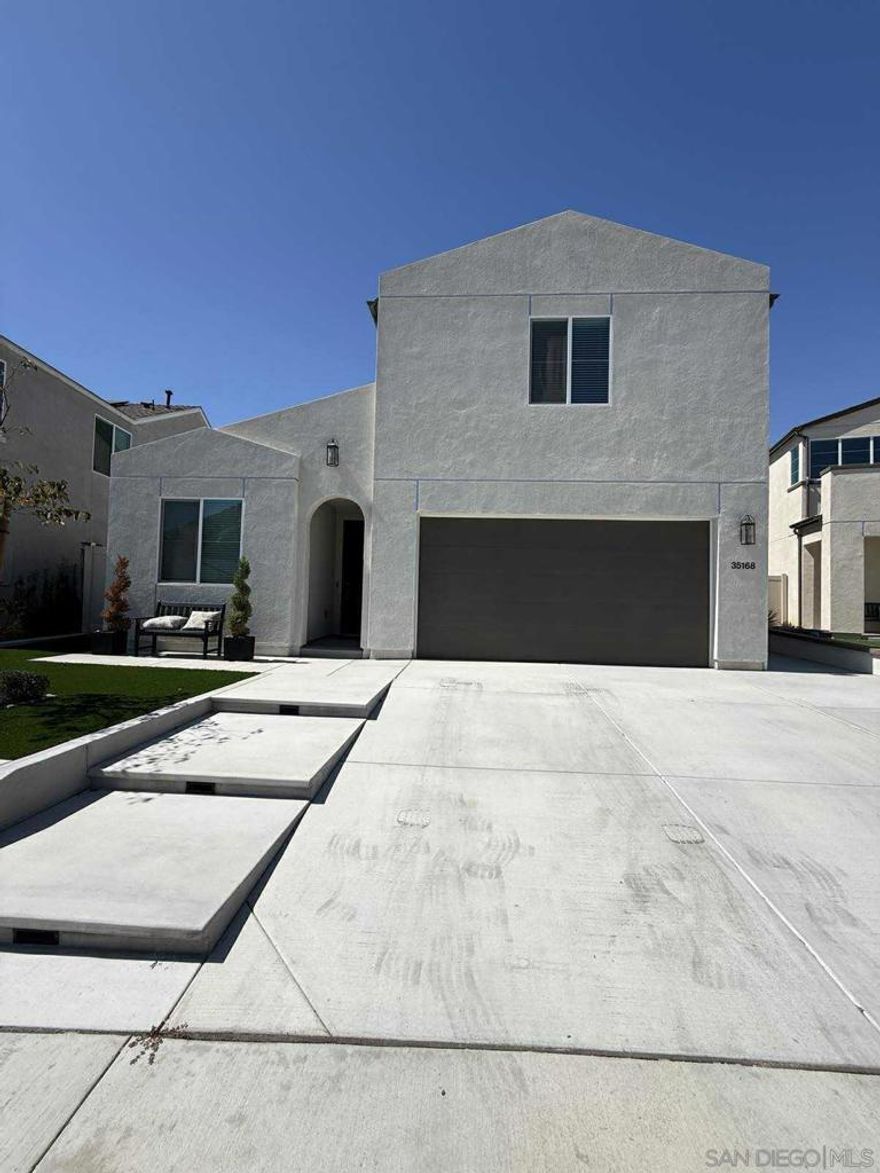 Nestled in the scenic hills of Fallbrook and surrounded by lush avocado and orange groves, this exceptional home offers the perfect blend of tranquility and modern living.  Step inside to an open and spacious layout designed for comfort and functionality. Large windows fill the home with natural light, creating a warm and inviting atmosphere. The property features fully paid-off solar, providing energy efficiency and peace of mind for years to come.  Enjoy the beautifully landscaped front and backyard, thoughtfully designed for easy maintenance and outdoor enjoyment. Whether you’re hosting a gathering or relaxing in the fresh Fallbrook air, the outdoor spaces are ideal for every occasion.  From the master balcony and backyard, take in epic panoramic views of the surrounding hills, orchards, and breathtaking sunsets. This home perfectly captures the charm and serenity of Fallbrook living while offering all the modern amenities you desire.  Don’t miss this opportunity to own a slice of paradise in one of North County’s most picturesque communities.  Nestled in the scenic hills of Fallbrook and surrounded by lush avocado and orange groves, this exceptional home offers the perfect blend of tranquility and modern living.  Step inside to an open and spacious layout designed for comfort and functionality. Large windows fill the home with natural light, creating a warm and inviting atmosphere. The property features fully paid-off solar, providing energy efficiency and peace of mind for years to come.  Enjoy the beautifully landscaped front and backyard, thoughtfully designed for easy maintenance and outdoor enjoyment. Whether you’re hosting a gathering or relaxing in the fresh Fallbrook air, the outdoor spaces are ideal for every occasion.  From the master balcony and backyard, take in epic panoramic views of the surrounding hills, orchards, and breathtaking sunsets. This home perfectly captures the charm and serenity of Fallbrook living while offering all the modern amenities you desire.  Don’t miss this opportunity to own a slice of paradise in one of North County’s most picturesque communities.