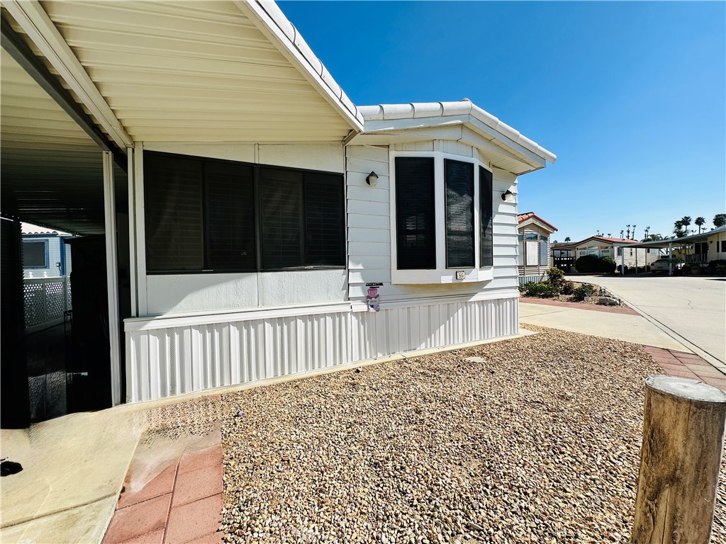 OWN YOUR LAND – Turnkey 1-Bed, 1-Bath Home in 55+ Gated Community!
Welcome to 1295 S Cawston Ave #86 in Hemet's coveted Mountain Shadows Resort — a secure, beautifully maintained 55+ gated community where YOU OWN THE LAND (no space rent!). This bright and airy 1-bedroom, 1-bath home features an open-concept layout, central A/C, appliances are negotiable, and a private enclosed patio. Enjoy low-maintenance living with access to top-tier amenities including a pool, spa, clubhouse, shuffleboard courts, and tons of community events. Whether you're retiring, downsizing, or snowbirding, this home offers resort-style living without the high monthly fees.