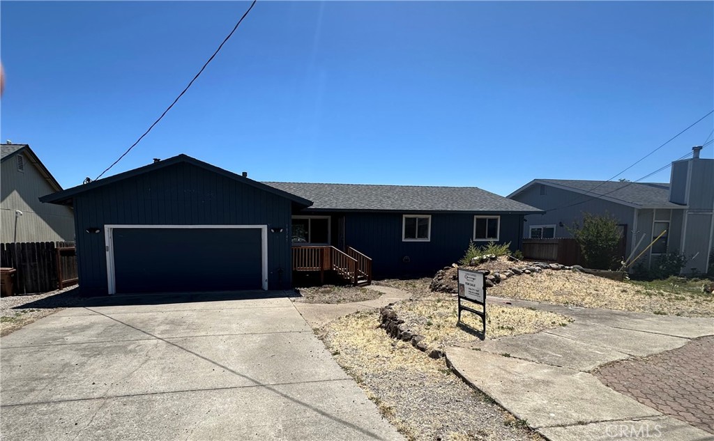 18745 Spyglass Rd in Hidden Valley Lake, CA is a 3-bedroom, 2-bath single-family home built in 1981, offering approximately 1,494 square feet of living space on a 7,835 square foot lot. The attached two-car garage includes washer/dryer hookups and 220V wiring, with two additional driveway spaces. The fenced backyard includes a large deck. Located within the gated Hidden Valley Lake Association, residents have access to a 102-acre lake, marina, golf course, tennis courts, stables, trails, parks, playgrounds, and a campground.