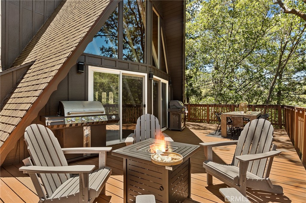 Welcome to Calgary Chalet, a 4 bedroom and 3 full bathroom cabin nestled in the enchanting and prestigious North Shore just a few minutes from the lake and Tavern Bay Beach Club. Step in and feel the peace in this perfect A-frame tri-level cabin that comes with full lake rights to Lake Arrowhead and access to a water stream located right in your own back yard. The cabin offers two decks that will provide unobstructed views of the forest perfect to enjoy your morning coffee or to enjoy an outside dinner with family and friends. Additionally, you will find a very rare main level parking driveway that will accommodate up to 5 vehicles. The cabin is currently operating as a short-term rental and income is available for potential buyers. Don't miss the opportunity to own your own piece of paradise!