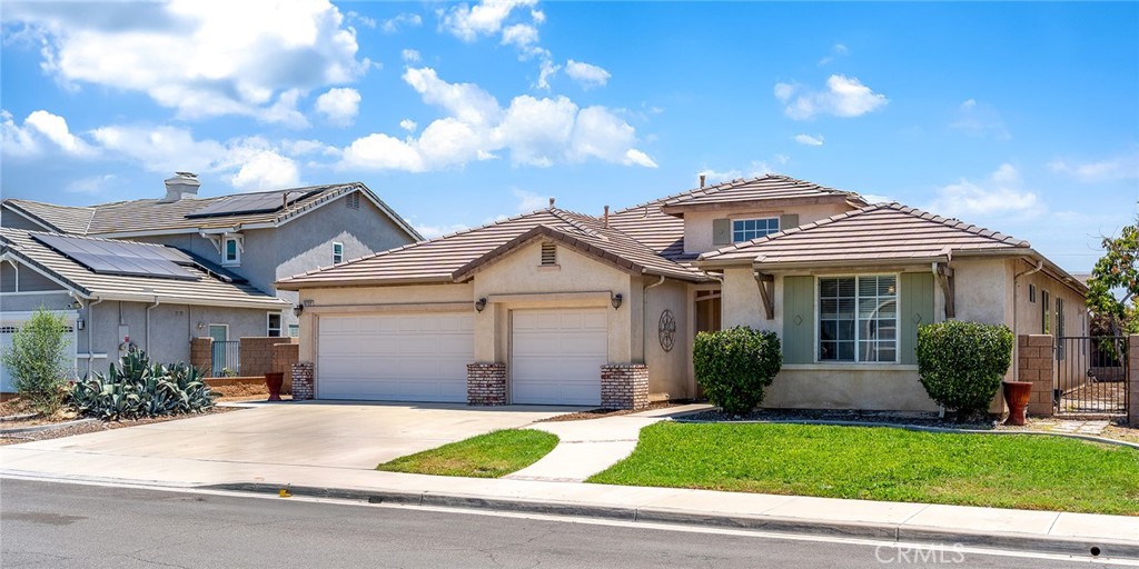MUST SEE! Beautiful Single-Story Home on a Spacious Lot in Prime Eastvale Location
This stunning one-level single-family home features 4 generously sized bedrooms and 3 full bathrooms, all set on a spacious 8,712 sq ft lot. The home welcomes you with high ceilings and elegant double-door entry, creating a bright and open atmosphere from the moment you walk in.
The kitchen opens seamlessly to the backyard through a glass sliding door, leading to a covered patio—perfect for family gatherings and outdoor entertaining. Inside, you’ll find beautiful wood flooring throughout the main living areas and stylish tile in the kitchen. The spacious master bedroom offers comfort and privacy, ideal for unwinding at the end of the day. The backyard is a true retreat, featuring a variety of mature fruit trees and ample space for gardening, play, or relaxing in your own private oasis. Located in the highly sought-after Eastvale community, this rare find is just minutes from 99 Ranch Market, Costco, top-rated schools, and a wide selection of shopping and dining options. Commuters will appreciate easy access to the 15, 60, and 10 freeways. Additional highlights include a three-car garage and a well-designed open floor plan that perfectly blends comfort and functionality.
