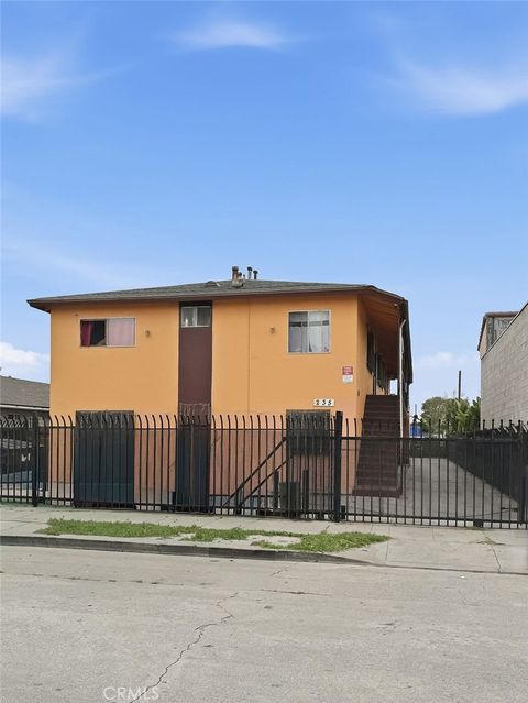 Photo of 235 E 87th Street, Los Angeles, CA 90003 (MLS # HD26039238)
