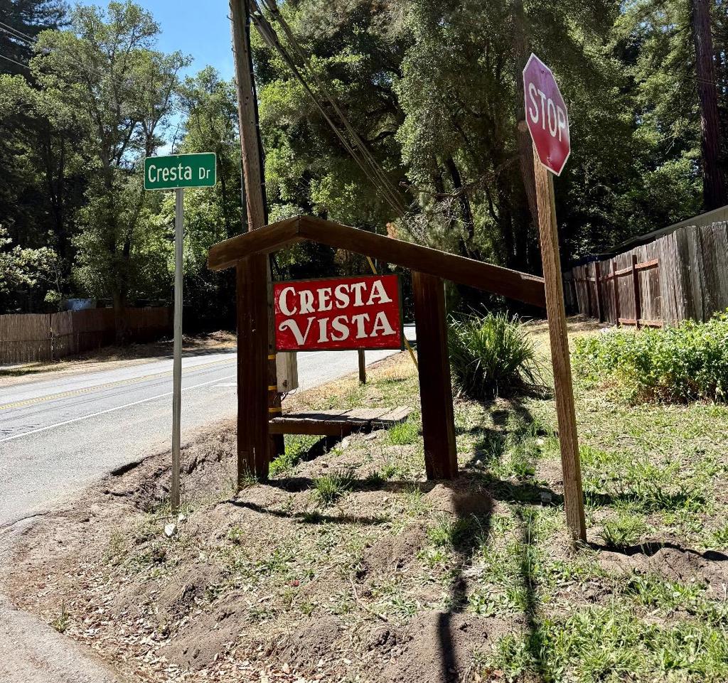 Unique Opportunity - Privacy Nestled Among the Redwoods 2.11 Acres with Development Potential in Boulder Creek. Three contiguous parcels (APNs 084-231-11, 084-231-12, and 084-231-13) totaling 2.11 acres. Per discussions with Santa Cruz County Planning, with a parcel merger combining the three parcels, APN 084-231-11 will support development: subject to required reports and final agency approval. A local reputable septic contractor visited the site and has indicated preliminary system feasibility. PG&E electric is available at the street. The land spans from Circle Way to Highrise Drive with a potential building site approximately 100 yards down a proposed driveway which offers end-of-road privacy just one mile to downtown Boulder Creek. Owner Financing Possible Broker/Owner Disclosure: Listing agent is a licensed California real estate agent & holds ownership interest in the property. Buyer is solely responsible for due diligence with Santa Cruz County Planning, Environmental Health & other agencies regarding zoning, merger, utilities, permits & development potential. Seller & broker make no guarantees regarding permitting or development. No representations or warranties express or implied are made regarding the condition, suitability, or entitlement status of the property.