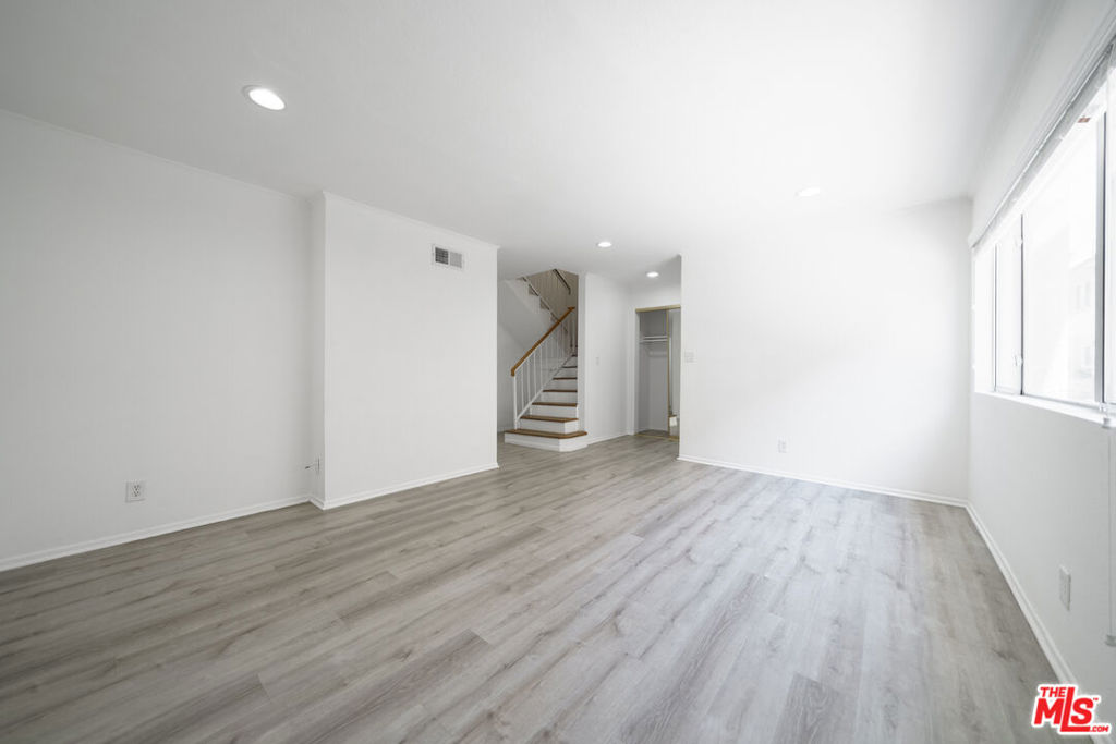 FHA-approved building, as well as for conventional financing... Great Investment for first-time homebuyers or an investor as a rental property. Beautiful, remodeled townhome located in the heart of Reseda. Great location close to the Metro bus stop going to the Los Angeles West-Side. Close to schools, CSUN & Pierce College, restaurants, grocery stores, and shopping. The property features hardwood floors throughout, high-ceiling bedrooms, a beautiful kitchen with, granite countertops, custom backsplash, and stainless steel appliances. 3 nice-sized bedrooms... the main bedroom with a nice-sized closet, and bathroom with shower stall and separate bathtub with jets. The property has an enclosed patio for a private BBQ and dining. Building is within a gated community that incl. amenities: a playground area for kids, area to walk your dog, N/S tennis and basketball courts, a community pool & spa, and a clubhouse. The property comes with 2 assigned parking spaces in the bldg subterranean garage. Must see to appreciate! This is a GREAT time to invest and live in Los Angeles with BILLIONS of $ going into development in preparation for the 2026 World Cup & the 2028 Summer Olympics!