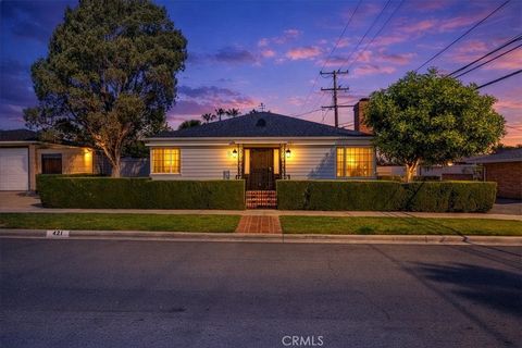 Photo of 421 E Roosevelt Rd, Long Beach, CA 90807 (MLS # RS26060302)