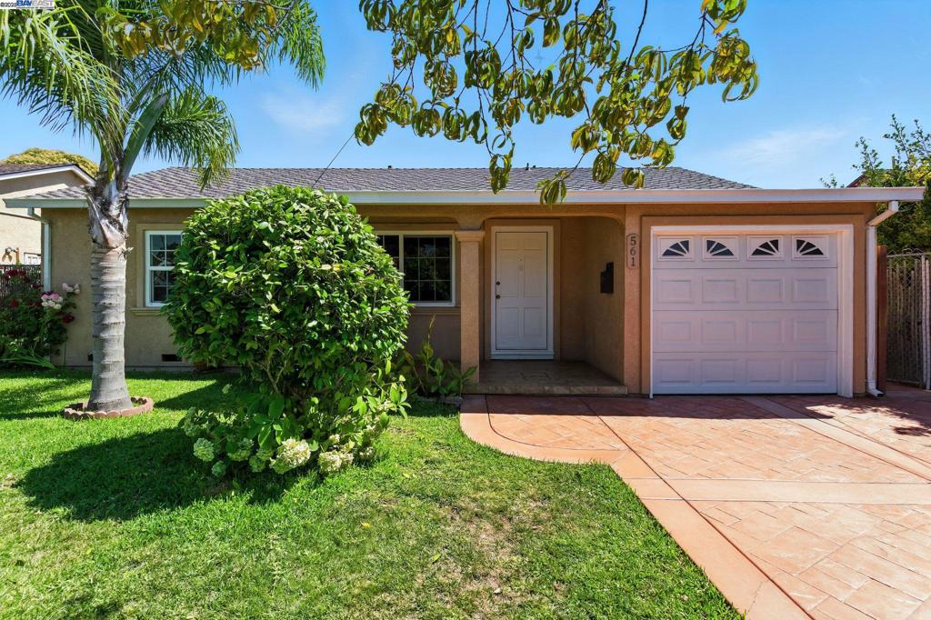 Beautiful turnkey home ready for new owners! Equipped with TWO BONUS ROOMS, the footprint is much larger than the listed 992 SF. Updated kitchen with granite countertops, tile floor and a recessed refrigerator to offer more space. Stall shower with mosaic tile floor. Refinished and refreshed hardwood floors in the 3 bedrooms. Bonus room 1 is an additional family room containing recessed lights multiple windows and sliding doors; light and bright space great for relaxing and entertaining. Bonus room 2 is a detached finished room, could be used as a bedroom, home office, work out room, play room and much more. Charming curb appeal with mature flowers and clean landscaping. Spacious and shaded backyard. Close proximity to schools, BART, shopping and commute. Don't miss this one!