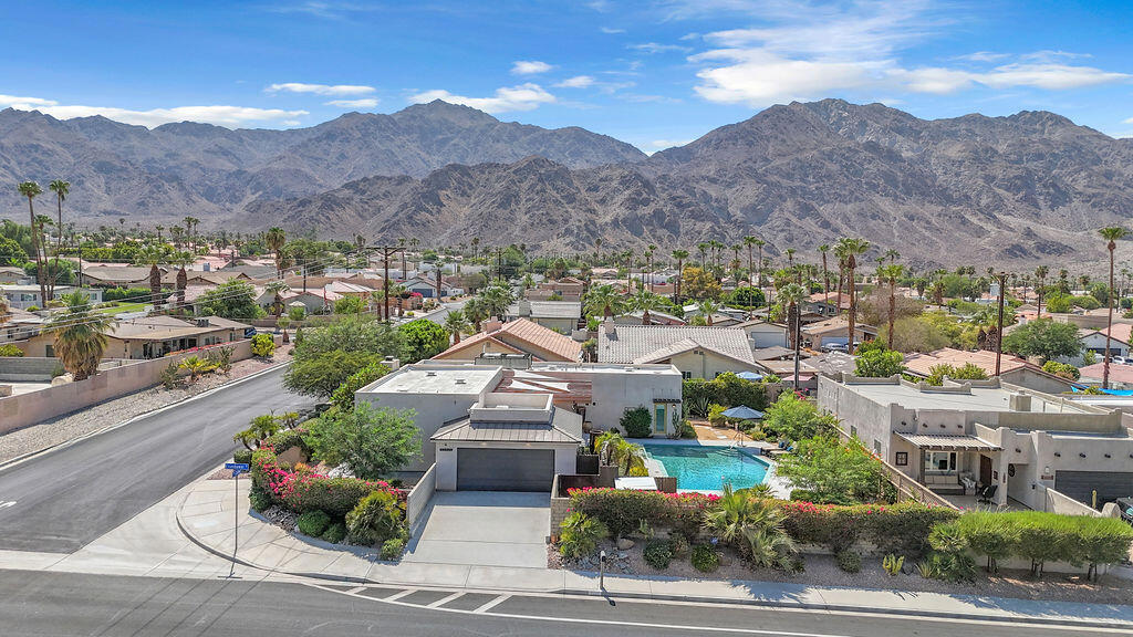 La Quinta Cove Lease, Seasonal or Long-TermExperience true desert living in this beautifully designed 3-bedroom, 2-bath home on a private oversized corner lot in the heart of La Quinta Cove. Designer details and a relaxed desert vibe create a welcoming retreat. Expansive sliders open to a spacious covered patio with ample seating, perfect for entertaining. Enjoy a sparkling pool, outdoor shower, and breathtaking mountain views. Fully furnished and ready for your stay, this home accommodates up to 6 guests (utility allowance limits apply). Located just minutes from charming Old Town La Quinta with dining, shopping, and hiking trails nearby.If you'd like, May- Sept $5000, Oct- Dec $5500, Jan - April $6500. Long Term lease rate is negotiable and does not include utilities.