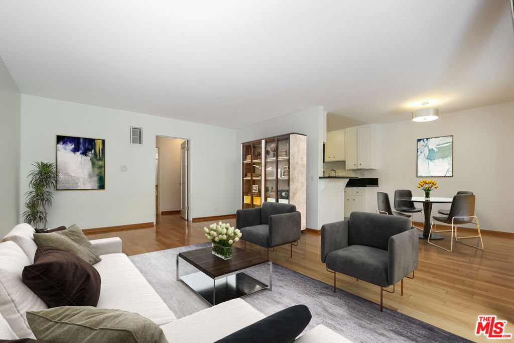 Welcome to this completely remodeled, bright, and spacious 2-bedroom, 2-bathroom apartment located in Westwood. The well-designed floor plan features a kitchen that opens to a dedicated dining area. The inviting living room flows seamlessly onto a private small patio ideal for enjoying your morning coffee or winding down in the evening.Beautiful real oak hardwood floors span the living and dining areas, while both bedrooms offer durable and stylish laminate flooring. The generously sized primary suite includes a walk-in closet and en-suite bathroom. You'll also enjoy ample storage throughout the unit, washer and dryer in unit, and two tandem parking spaces.Conveniently located near UCLA, Century City Mall, Silicon Beach, the Google Campus, major freeways, and an array of shops and restaurants this is Westside living at its best!.
