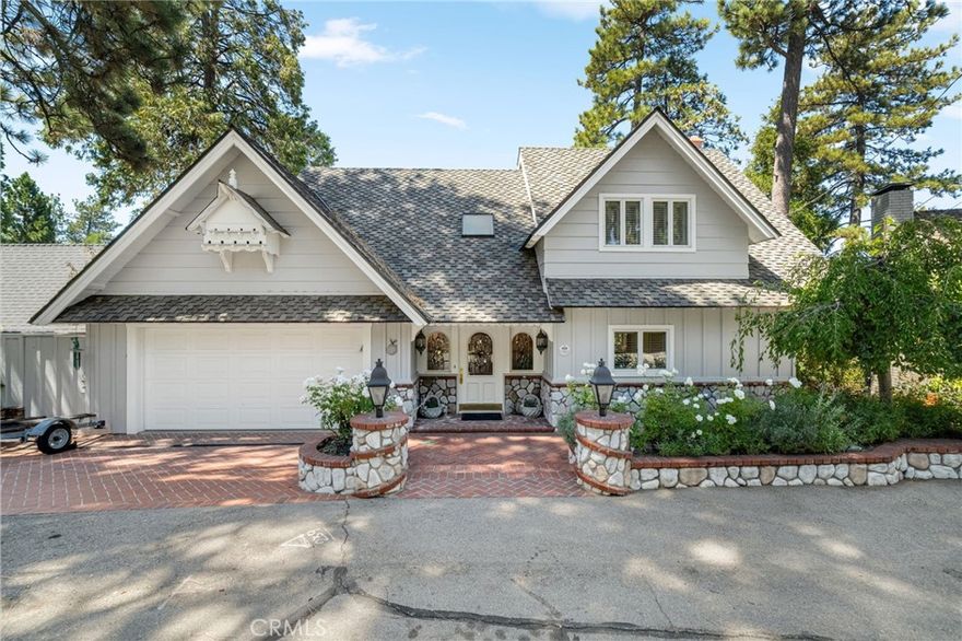 Wow, this is one of the best Lakefront, lake view homes in Lake Arrowhead.  Walk straight into this level entry 5 bedroom,5 Bath custom home and get blown away by the lake view and overall orientation to lakefront living.  The family area and primary suite features custom coffered ceilings, and expansive west facing views.  The home is immaculate, the exterior has a new roof, new exterior paint and the detail to the construction of the  brand new deck is impressive.  The access to the dock couldn't be more perfect, nice easy path detailed in used brick fronts the property and takes you to your private lakeside patio with Single Slip Dock.  The Dock amenities include, a hydro hoist under a nautical  canopy, side tie for guest and additional rear tie up, currently used for a Boston Whaler for easy convenient transportation to Restaurants, Bars, Loan Pine Island, Marina, and other Lake features.  The Dock and Patio also include, a Dock House for all your sporting goods, exterior furnishings, and service area with refrigeration for beautiful afternoon entertainment for the entire family.  This property is ready to enjoy.  This property is viewed by appointment only. 

Dock Number : S333