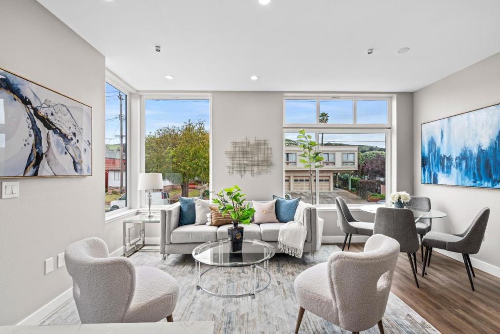 Discover an exceptional opportunity with this spacious 4-bedroom, 3.5-bath townhouse, perfectly blending modern design and unbeatable location. Just one mile from BART and Caltrain, and only 4 miles from SFO, this property offers unmatched commuter convenience. Inside, the home features elegant laminate flooring, a modern kitchen with quartz countertops and a large island, plus a private balcony with beautiful views. The energy-efficient solar system provides long-term savings, while the one-car garage and nearby bus stops add everyday practicality. Set in a family-friendly neighborhood with nearby parks, this property appeals equally to homeowners and investors. Its layout and location make it an attractive option for high-paying mid-term rental tenants, delivering excellent income potential. Dont miss this rare chance to own a versatile home that combines lifestyle, location, and strong investment value.