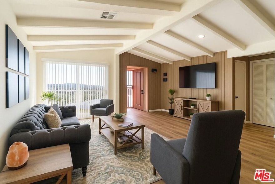 Experience serene mountain living in this beautifully remodeled  Chatsworth Lake Manor cottage, offering complete privacy and unobstructed panoramic mountain views. Currently a short term rental bringing in $5000-$6000 per month.Nestled in one of the most peaceful pockets of the San Fernando Valley, this home blends modern sophistication with natural surroundings.Step inside to soaring high-beam ceilings and an inviting living room anchored by exposed beams and abundant natural light. The chef's kitchen is designed with a center island, stunning quartz stone counters, and stainless steel appliances, ideal for entertaining and everyday cooking.The primary suite offers a quiet retreat. Additional interior highlights include a washer and dryer, updated flooring, recessed lighting, and thoughtfully selected high-end finishes throughout the home.The backyard is a true extension of the living space, showcasing breathtaking mountain and boulder views, and a brand-new BBQ, perfect for outdoor dining or unwinding under the open sky.Located steps from incredible hiking trails, and neighborhood market, the property provides immediate access to nature while remaining centrally located. This is a turnkey, fully reimagined traditional offering a rare combination of tranquility, style, and modern comfort. Included in this sale are a total of 6 lots, with an estimated 18,000 SF combined. A developers dream with the possibility of building multiple homes. Parcels included in the sale are 2007-024-015, 2007-024-008, 2007-024-012, 2007-024-013, 2007-024-014, 2007-024-016.