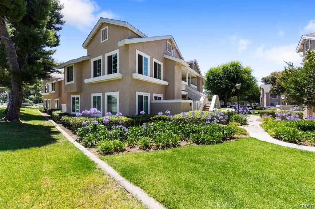 IDEAL location with views , Woodbridge High School (just across the street) and Mark Daly Athletic Field, highly favorable for walkability - less than 0.25 mi walk to major centers which include Sprouts, Rite Aid, Target, LA Fitness, Starbucks, 7/11, banks, salons, movie theater and trending restaurants. Corner, LIGHT & BRIGHT upstairs unit with vaulted ceiling - 2 bedroom, 1.25 bath with newly remodeled floors, double-pained sound-reducing windows, flooring/carpeting and additional study center and closet built into one of the bedrooms which also contains a reading nook by the window. Master bedroom contains private sink and large walk-in closet. Appliances include refrigerator, stove, microwave, dishwasher, and inside washer/dryer and also includes private , covered patio entrance with additional storage. Unit is unfurnished and comes with an assigned, covered carport. As a Woodbridge resident, you will have premier access to the exclusive Woodbridge association amenities including 2 lakes with sand beach lagoons, boating & fishing, 20 pools, 20+ tennis courts, basketball, volleyball, playgrounds, parks, fitness course, and a multitude of family-friendly activities. In addition, children of Woodbridge residents are able to attend highly sought after blue ribbon schools within the well-known and highly regarded Irvine Unified School District, which are a safe and short walk from this location.