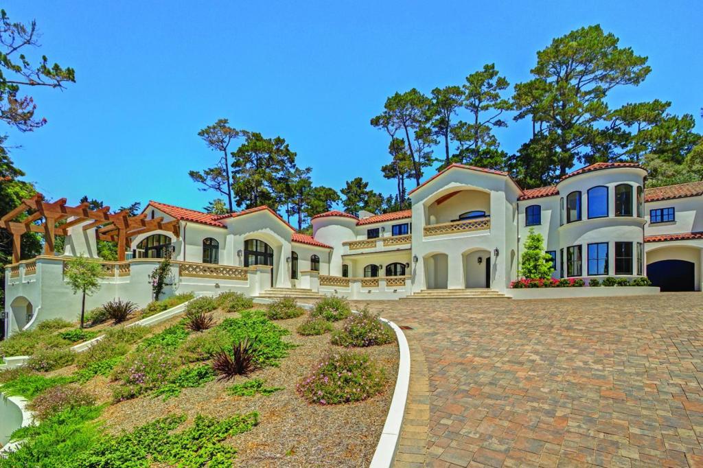 Sited in the very heart of Pebble Beach along 17 Mile Drive is this stunning Mediterranean residence which was expanded and renovated in 2014. Offering four bedrooms and six and a half bathrooms, large family room with access to private patio and ocean-view terrace, dining room, 3-car garage and spectacular views of the 15th fairway and the Pacific. This stunning home is the truly gracious luxury in Pebble Beach. Live the dream, live along 17 Mile Drive, live in gracious luxury in Pebble Beach.