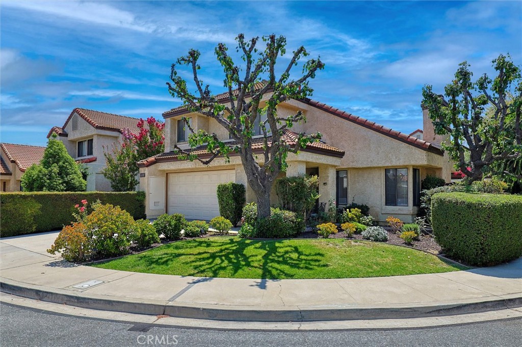 Situated in the desirable, family-friendly Autumnwood community, this updated 3 Bedroom, 2.5 Bathroom, 1,719 sq ft home blends comfort, convenience, and charm. Enjoy resort-style living with a sparkling pool, soothing spa, and scenic walking paths perfect for an evening stroll. Set on a corner lot with water-wise landscaping, this home warmly welcomes you with vaulted ceilings in the living and dining rooms, a cozy fireplace & a spacious country kitchen with stainless appliances opening to the family room. You will appreciate the functional & flexible floorplan that easily accommodates different lifestyles & needs. Upstairs you’ll find a spacious private master suite offering a walk-in closet, dual-sink bath, and separate water closet, 2 additional bedrooms and a full bath. Step outside to a serene retreat with two patios, lush greenery, and mature trees creating shade and privacy—ideal for outdoor dining or quiet mornings. This property has a spacious 2-car attached garage with a work bench & storage closets, a separate interior laundry, and lots of storage closets & linen cupboards. Recent updates include life-proof vinyl flooring, new sinks, faucets, toilets, lighting & outlets. The surrounding area is perfect for active families! You’ll be just across from Rancho Santa Susana Community Park with playgrounds, sports fields, a gymnasium, and endless recreation, and close to schools, shopping, dining & entertainment. Don’t miss out on this one!