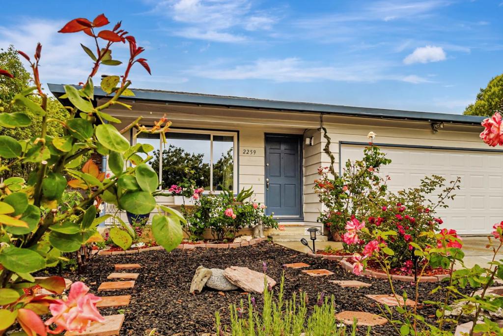 Welcome to this inviting 3-bedroom, 2-bath home with a beautiful rose garden in front! Excellent opportunity for first-time buyers! Conveniently located in a central Live Oak neighborhood close to shops, restaurants, schools and freeway access. This move-in ready home offers comfort, space, and room to grow. Newly installed Luxury Vinyl Flooring throughout makes maintenance a breeze! Step inside to a bright and open living area, perfect for relaxing or entertaining. The kitchen offers great counter space and storage, with plenty of potential to make it your own. The primary bedroom features its own private bathroom, and two additional bedrooms provide space for a home office, guests, or a growing family. Enjoy the convenience of an attached 2-car garage and a spacious backyard that's a blank canvas, ideal for creating your dream outdoor space, whether its a garden, play area, or patio retreat. ADU? This home has everything you need to get started and the potential to make it truly yours!