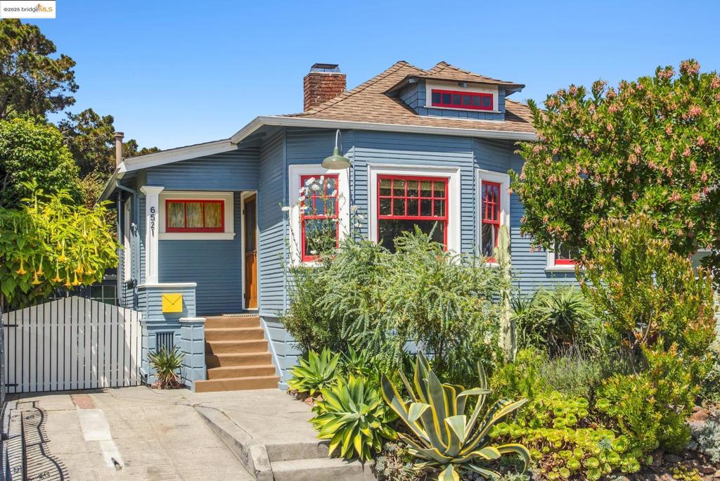 This lovely & light-filled 2 bed/1 bath classic California bungalow has been meticulously restored and updated to combine ample period details with contemporary functionality and comfort. Highlights include stunning original hardwood flooring, panels, wainscoting, and mantel. The bathroom features a charming clawfoot tub, while the fantastic period-style eat-in farmhouse kitchen boasts a wonderful Wedgewood gas stove. Absolutely every element has been chosen with careful and loving attention to detail. The exterior is a true oasis, surrounded by lush, mature landscaping featuring succulents, Brugmansia, and native plantings. The private backyard garden is spectacular, complete with a flagstone patio and a cedar hot tub, ideal for morning coffee or an evening aperitivo. An ample detached garage, with potential as a studio, workshop, ADU, or home office, adds to the property's versatility. There's also a huge additional basement, perfect for storage or future expansion. Located in the tight-knit and somewhat under-the-radar Paradise Park neighborhood, this home offers superb urban convenience and is a fantastic location for SF commuters. It provides a rare combination of seclusion and easy access to all the best the Bay Area has to offer. A must-see!