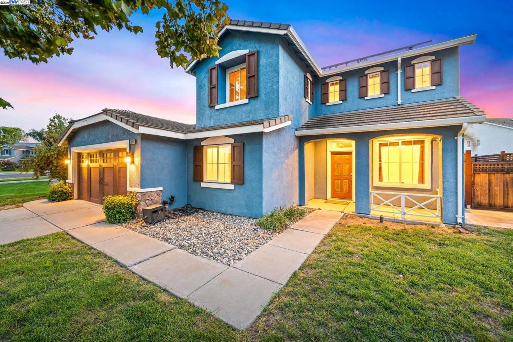 Welcome to this spacious EAST facing 5-bedroom, 3-bath home in Tracy’s desirable Bridle Creek neighborhood. With 2,447 sq ft, this two-story offers a flexible floor plan and a large upstairs loft—ideal for an office, playroom, or media space. The updated gourmet kitchen is a chef’s dream with stainless steel appliances, DOUBLE ovens plus gas range w/ an ADDITIONAL oven, a butler’s pantry, abundant cabinetry, and generous counter space. A temperature-controlled wine closet is perfect for enthusiasts. The kitchen flows into the cozy family room with a fireplace. The TWO DOWNSTAIRS BEDROOMS and a full bath are perfect for guests or multi-generational living. Upstairs, the primary suite features spacious closets and an ensuite bath. Two additional bedrooms share a Jack-and-Jill bath, plus a versatile loft. Outside, enjoy your private oasis with an in-ground pool and spa. OWNED SOLAR, Vivint System, central heating/A/C, inside laundry with washer and dryer, and 2-car garage complete the package. Located on a quiet street near schools, parks, shopping, and commuter routes. Don’t miss your chance—schedule your private tour today!