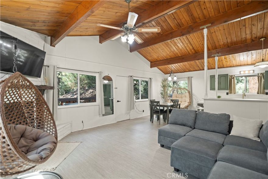 Located in the heart of Pine Mountain Club, this charming single-story, 3-bedroom, 2-bathroom home combines mountain tranquility with modern comforts. Just moments from scenic hiking trails, the village center, clubhouse, and all community amenities, the setting is as convenient as it is serene.



Inside, an open floor plan connects the living, dining, and kitchen areas, framed by newer dual-pane windows that invite natural light and sweeping views of the Jeffrey pines. A classic brick fireplace anchors the living room, featuring a rare built-in barbecue on the reverse side—perfect for cozy winter nights or summer gatherings.



Step outside to enjoy the expansive front and back decks, ideal for entertaining or simply soaking in the beauty of the surrounding forest. The gentle downslope from the street enhances privacy, while the recently installed fence offers both seclusion and ultimate use of the outdoor space. Interior garage access and ample storage add ease to daily living.



Recent upgrades include a renovated primary bathroom (2024/2025), new refrigerator and range (2025), refreshed kitchen cabinetry with gold-accent hardware, a farmhouse sink, updated light fixtures, full interior paint, gutters, new insulation, and an automatic garage door opener. An added highlight: the majority of the home’s furniture, along with all appliances, are included—making this property truly move-in ready.



Homeownership in Pine Mountain Club includes membership in the Property Owners Association, with monthly dues of $165. Residents enjoy access to an array of amenities, including an Olympic-style pool and spa, tennis and pickleball courts, a nine-hole golf course, an equestrian center, and more. The community also provides essential year-round services such as 24/7 security patrol, trash and recycling collection, road maintenance, and snow removal. For added reassurance, Kern County Fire Station 58—staffed with paramedics and equipped with a helipad—is located within the community, ensuring prompt emergency response when needed.



Blending convenience, comfort, and the natural beauty of Pine Mountain Club, this home is an inviting retreat ready to be enjoyed year-round.? Don't miss it, schedule your showing today!