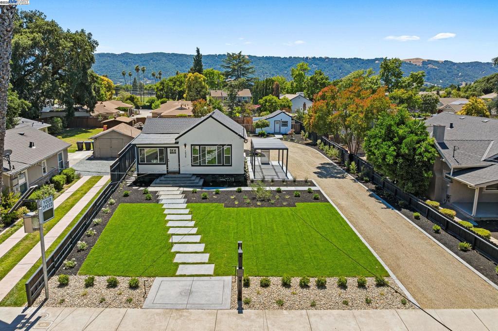 Permit in process for second ADU. Welcome to a rare opportunity in the heart of downtown Pleasanton, two homes on one lot offering charm, flexibility, and major upside. The beautifully updated main home features wide plank wood flooring, recessed lighting, and a chef inspired kitchen that’s perfect for cooking and entertaining. The detached ADU has its own private entrance and full living quarters, ideal for guests, multigenerational living, or consistent rental income. But here’s where it gets exciting: SB 9 research is in progress to explore the possibility of a lot split, which could unlock even more potential. Whether you’re an investor looking to maximize returns, a homeowner seeking rental cash flow, or a visionary ready to develop a third dwelling, this property offers room to grow. All of this is located just minutes from top rated schools, shopping, dining, and commuter routes, blending downtown convenience with long term opportunity. Don’t miss your chance to own this Pleasanton gem with income potential and future development upside.