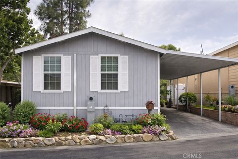 Photo of 4201 Topanga Canyon Boulevard #21, Woodland Hills, CA 91364 (MLS # SR26073758)