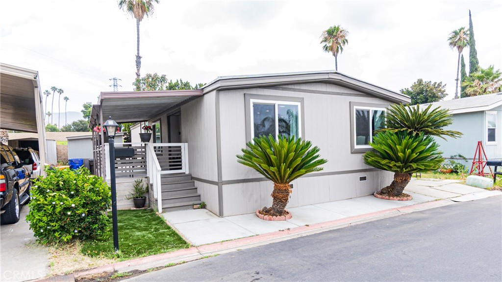 Approximately 50K worth of upgrades and updates on this Gorgeous home with low monthly land lease. Completely remodeled and upgraded, raised ceilings, newer laminate floors, remodeled kitchen and counters, remodeled bathrooms, new plumbing, new electrical wiring, recessed lighting throughout, newly insulated, new double pane windows, new flooring underlay, newer interior and exterior paint plus much more.... Super easy access off 60 Freeway and close to all amenities like shopping and stores. Home has been nicely upgraded and maintained and community offers pool and clubhouse access.
