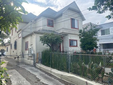 Photo of 1850 W 11th Pl, Los Angeles, CA 90006 (MLS # SB25264688)