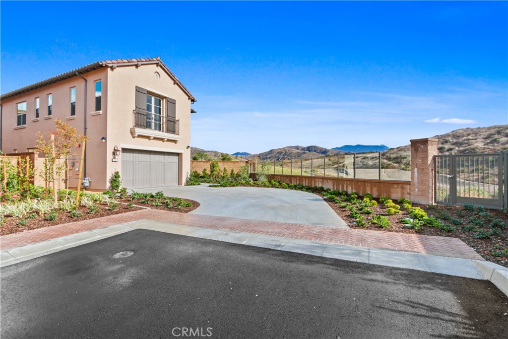 View! View! View! Discover a brand-new luxury single-family home with one of the largest lots and breathtaking 270° mountain views in Portola Springs. Built in 2023 by Irvine Pacific in a refined Tuscan style, this residence offers 4 bedrooms, 4 bathrooms, and a spacious loft, plus a solar panel system for energy efficiency.
An elongated driveway and sleek glass fencing frame the expansive ~12,000 SF lot. Inside, enjoy wood flooring throughout and a gourmet kitchen with Wolf range and Sub-Zero refrigerator—perfect for everyday living and entertaining. The wide-open yard provides exceptional privacy and plenty of space for outdoor dining, play, and relaxation.
Located in the Irvine Unified School District, moments from top-ranked Portola High School, community parks, pools, and scenic trails, with easy access to Hwy 133, 241, and I-5.