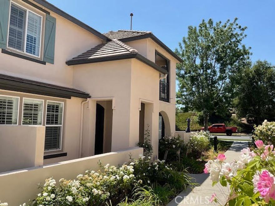 Welcome to this charming and beautifully maintained townhouse located in the highly desirable West Creek Village of Valencia. The inviting kitchen features granite countertops, stainless steel GE appliances, and a full-size refrigerator, perfect for everyday living and entertaining. The open-concept downstairs area includes a comfortable family room, dining area, and a convenient half bathroom, along with a welcoming front porch ideal for relaxing outdoors. You’ll also enjoy direct access to a two-car garage with custom built-in storage. Upstairs, you’ll find three spacious bedrooms and two full bathrooms, along with a full-size GE washer and dryer for added convenience. Each bedroom features a large walk-in closet, and the home showcases newly upgraded wood-style flooring throughout. The West Creek Recreation Center is just a short walk away, offering resort-style amenities including a pool, spa, kids’ wading pool, BBQ area, and lounge space. The nearby park features a playground, covered picnic tables, BBQs, and a basketball court. Enjoy over 30 miles of scenic paseos—beautifully landscaped pedestrian and bike trails that wind throughout the Valencia community.
This home is located within the award-winning School District, featuring West Creek Academy, a highly regarded music and academic magnet school. It’s also within walking distance of Rio Norte Junior High and just minutes from Valencia High School, shopping, dining, and freeway access.