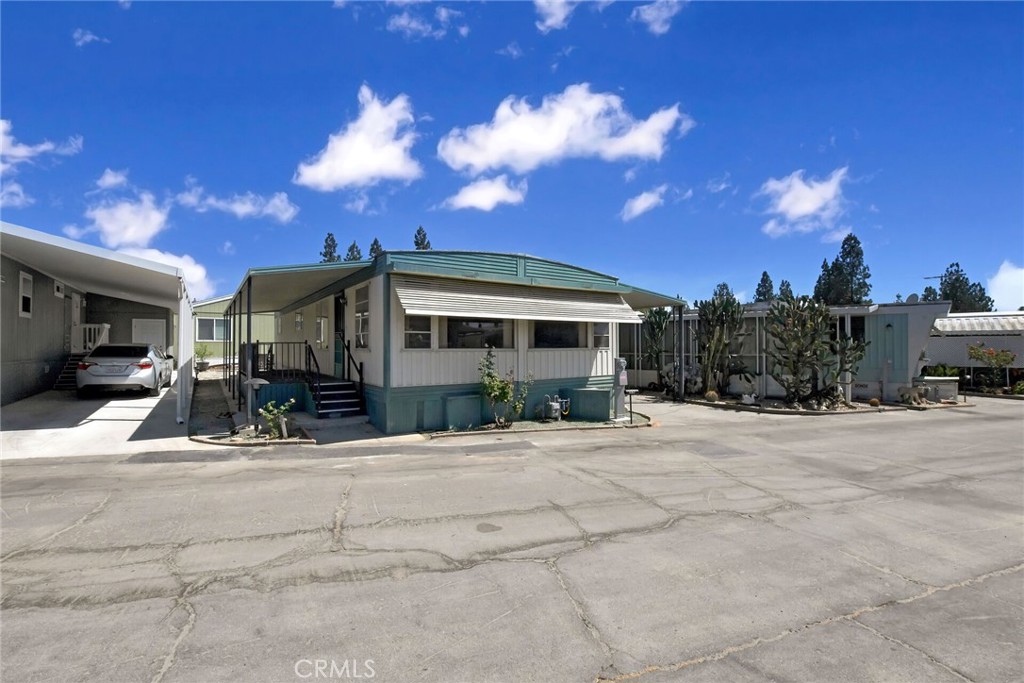 Charming 2-Bed, 2-Bath Home in a Desirable 55+ Community of Azusa in the Foothill Vista Mobile Home Park Near Glendora. Located in the peaceful North Azusa neighborhood just steps from Glendora, this beautifully maintained 2-bedroom, 2-bathroom mobile home offers the ideal blend of comfort, affordability, and convenience. Situated in a highly sought-after 55+ community with a low space lease of just $1,200/month, this home is perfect for those looking to simplify, downsize, or create a flexible living arrangement. Enjoy easy access to local colleges, shopping, dining, and entertainment, with the Foothill Gold Line just a short walk away for stress-free commuting. While the primary homeowner must be 55+, residents 18+ are welcome—making it a great setup for a parent with college-aged children. This pet-friendly community allows up to two pets under 30 lbs. Clubhouse with kitchen, library, Heated Community Pool, Community Spa, Exercise room, RV and Doggie Park Area. MANY MONTHLY ACTIVITIES ARE SCHEDULED FOR RESIDENTS! A MUST SEE!!! Buyers must be approved by park management. Don’t miss this rare opportunity to live in a quiet, connected, and welcoming neighborhood.
