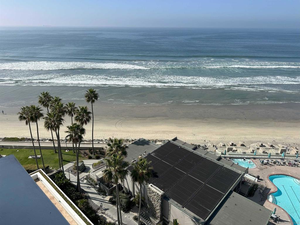 Enjoy the best of Coronado Beach and San Diego Bay from the gem of Coronado Shores at La Perla Tower. Spacious and beautifully remodeled 2 BR/2 BA corner unit boasts gorgeous ocean, skyline and bay views. Luxurious King bed in the primary bedroom, 2 plush Queen beds in guest room. Updated bathrooms. Automated blinds. Beachy tile floors, kitchen with high end appliances including Miele dishwasher, Thermador oven/range and Kitchen Aid refrigerator. Tandem secure parking spots in garage. Quick walk to historic Hotel Del Coronado, shops and restaurants. Enjoy pools, tennis courts and gym.