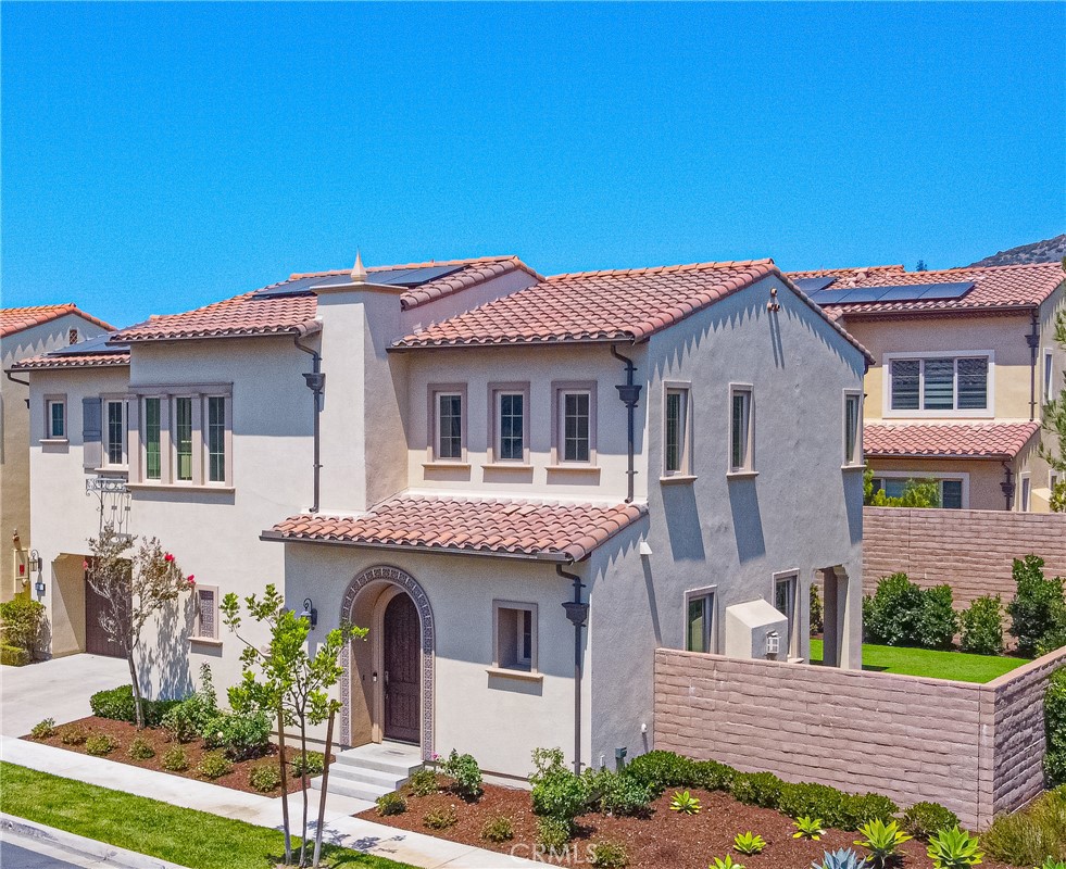 LUXURY RENTAL IN ORCHARD HILLS – CORNER LOT VARENNA RESIDENCE. Discover upscale living in this absolutely stunning 4 Bed / 3.5 Bath home, ideally situated on a premium corner lot in the highly desirable guard-gated community of The Groves at Orchard Hills in Irvine.
This Varenna plan offers a highly functional layout featuring a main-level bedroom with en-suite bath—perfect for guests or extended family. The open-concept Great Room includes a cozy fireplace and seamlessly connects to the gourmet kitchen and dining area, complete with a large center island, stainless steel appliances, walk-in pantry, and built-in refrigerator with ice/water dispenser. The adjacent California Room (covered patio) provides an ideal indoor-outdoor living experience.
Upstairs, retreat to the luxurious primary suite featuring a spacious walk-in closet and a spa-like bath with soaking tub and separate shower. Two additional bedrooms, a versatile loft, hallway bath, and individual laundry room (with front-loading washer & dryer included) complete the second floor. The home also features: Drought-tolerant landscaping with artificial turf, 12 rooftop solar panels to reduce electricity costs, tankless water heater and whole-home water softener system.
Enjoy access to resort-style community amenities: pools, spas, BBQ areas, parks, sport courts, scenic trails, and a clubhouse—all within a 24-hour guard-gated community with two manned security gates. Conveniently located near award-winning Irvine schools, Orchard Hills Shopping Center, Tustin Marketplace, Irvine Spectrum, and major freeways (261/241/5) and John Wayne Airport.
Available now – don’t miss your opportunity to live in one of Irvine’s most prestigious neighborhoods!
