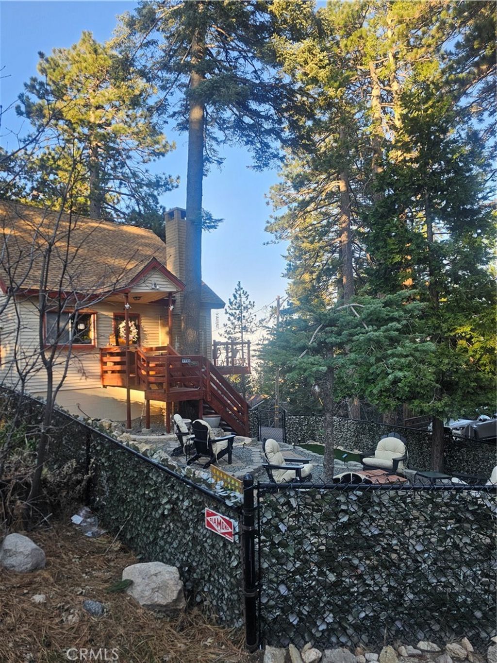 Photo of 1130 park place Pl, Lake Arrowhead, CA 92378 (MLS # IV26044964)