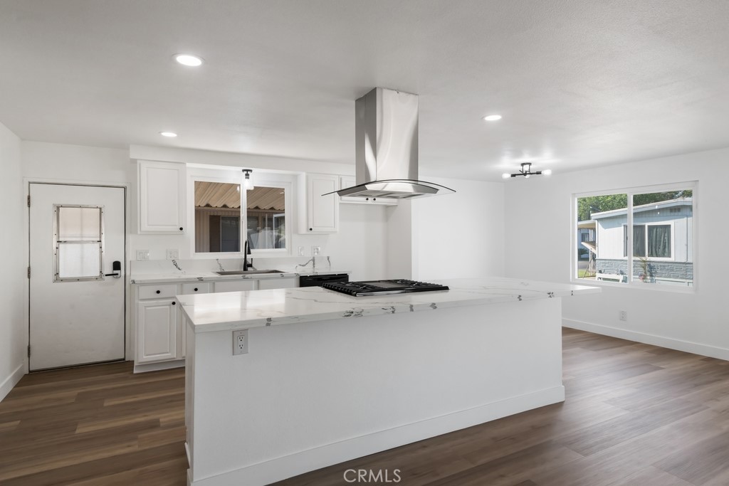 Step into a bright, open living area with a seamless flow to the kitchen and dining room—perfect for entertaining. This 3-bedroom home also features a versatile den/office, offering flexibility for work or guests.
Completely renovated from the inside out, the home was taken down to the studs and rebuilt with all-new drywall, ceilings, lighting, bathroom vanities, counters, mirrors, and fixtures. The kitchen boasts a spacious island with seating, refinished cabinets, updated countertops, sink, and stove. Additional upgrades include new dual pane windows, fresh interior and exterior paint, and updated finishes throughout—creating a like-new home in a charming park.
Enjoy community amenities including a pool, tot lot, basketball court, and recreation center. Move right in and start enjoying your beautifully renewed home and welcoming neighborhood. Move in ready- come see it today!