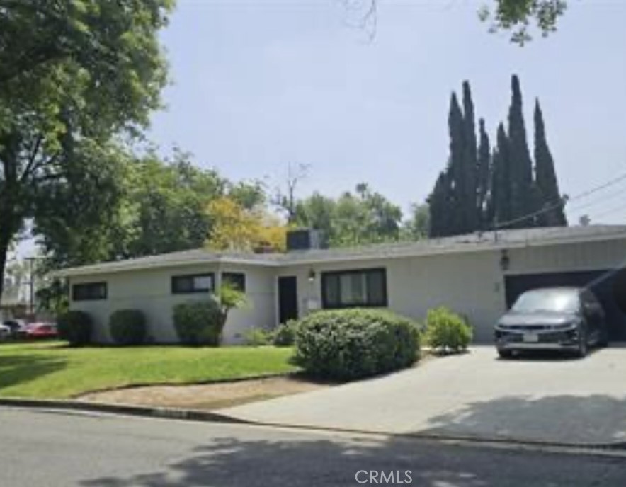 Welcome to this charming single story home located on a desirable corner lot. This spacious property features a 3 bedroom 2 bathroom perfect for comfortable living. The possibilities of this property are endless!. Enjoy the convenience of a 2 car garage along with ample parking spaces in the driveway. The open kitchen concept is amazing and the back patio is perfect for a quiet outdoor getaway. With this open layout and inviting atmosphere this home is ideal for family gatherings and entertaining guest. This is not just a property, it’s an oasis. This property comes with an exceptional level of surveillance; supporting safety and peace of mind. Don't miss out on making this your new home!