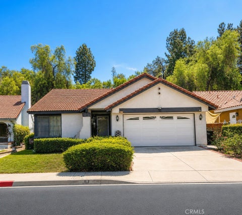 Photo of 63 Rainbow Ridge RD, Phillips Ranch, CA 91766 (MLS # TR26197474)