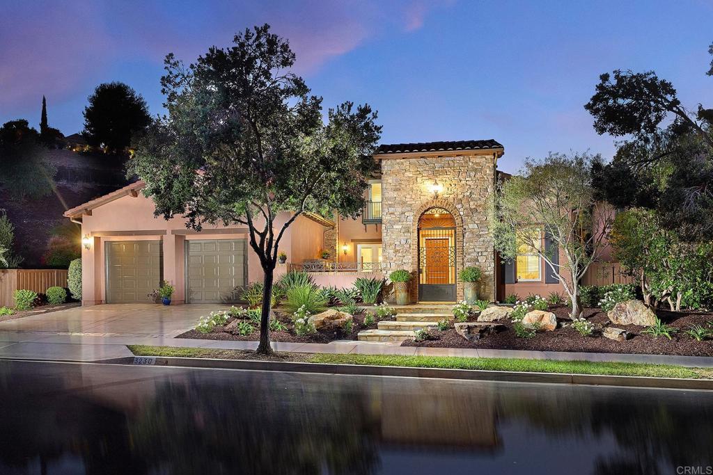 Coveted Floorplan | Main Level Owners Suite | Premier La Costa Ridge Location. Tucked at the end of a peaceful, private cul-de-sac in the prestigious gated enclave of La Costa Ridge, this exceptional home sits on an expansive ½-acre lot offering serene privacy and refined elegance. One of the most sought-after floorplans, it features a luxurious first-floor primary suite plus a separate guest suite on the main level—ideal for multi-generational living or out-of-town visitors. Upstairs, you’ll find two spacious bedrooms and a versatile loft perfect for a home office, media room, or play space. From the moment you arrive, this home impresses with its stone and brick façade, custom wrought iron gate and private flagstone courtyard with a cozy outdoor fireplace—a perfect setting for entertaining or quiet evenings under the stars. Additional outdoor living spaces include a grand covered rear patio and a secluded side courtyard, offering multiple areas to relax and unwind. The professionally designed landscaping boasts a variety of drought-tolerant plants and a zoned irrigation system for effortless maintenance. Inside, the home features fresh paint and newer carpet, providing a move-in ready canvas for your personal touch. Enjoy the security and tranquility of one of North County’s most exclusive communities—La Costa Ridge—while being just moments from top-rated schools, world-class golf, shopping, dining, and the beautiful beaches of Carlsbad.