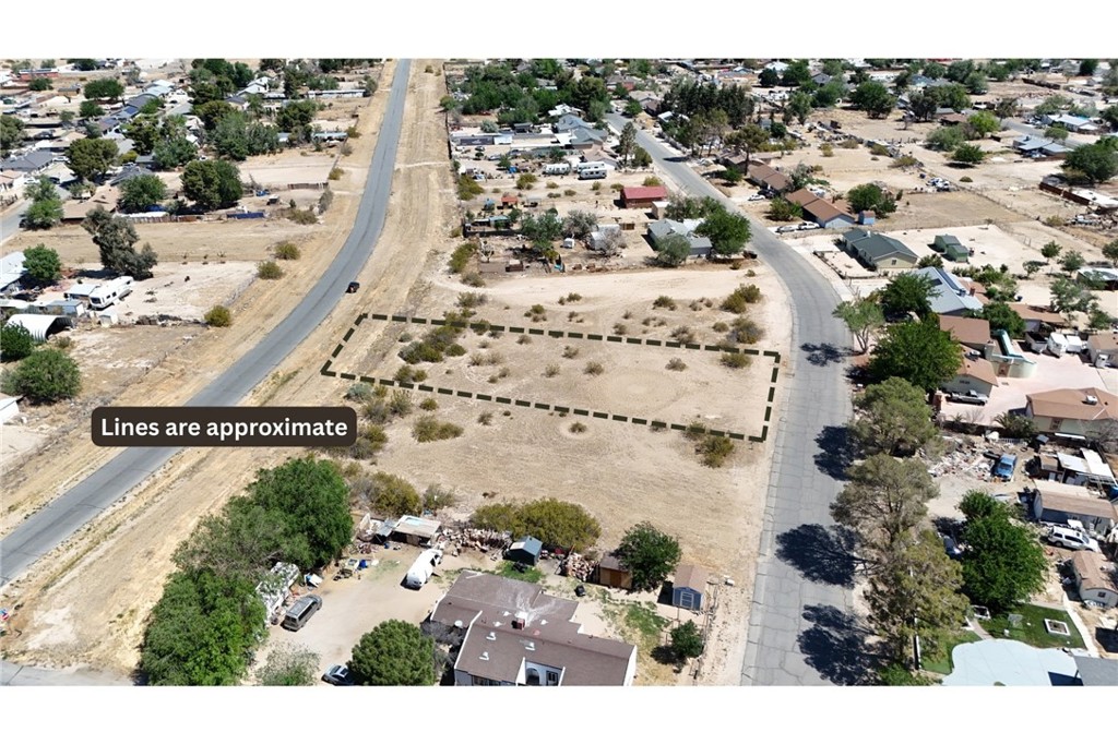 Lot 109 on Ridgemist St/175th St E on the other, (APN: 3072-015-027) GPS: 34.611477, -117.817415 This residential lot is located in Lake Los Angeles area in Los Angeles County. This lot has been zoned as Residential Agriculture (R-A). This R-A (Residential-Agricultural) zoning in Los Angeles County allows for single-family homes and certain agricultural uses, making it ideal for properties with a rural or semi-rural character. This zoning permits keeping livestock and growing crops, subject to specific regulations, while maintaining a residential focus. It provides flexibility for those looking to combine residential living with small-scale farming or animal husbandry. Utilities are provided in the street. The lot is provided water by the LA County Water District, WWD-40-38. Electricity is in the street. Residents in the area have private septic tanks for their sewer needs. This property does not yet have an address. While the boundary lines on the map offer a glimpse, they are only approximate. A Buyer should verify boundaries, zoning and utilities, ensuring every aspect aligns with their vision for the property. Adjacent lot is also for sale.