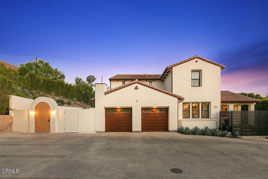 It's the lifestyle you deserve with the primary bedroom downstairs! Stunning custom built 4 bedroom, 3.5 bath home with a floorplan that provides 4109sf of luxurious, light filled living spaces, custom finishes include modern hardwood floors, Viking stainless steel appliances, quartz counters, custom walnut cabinetry, solid wood 8-ft custom doors, Anderson windows and copper gutters and downspouts. The downstairs open floorplan includes living room, formal dining room, open and airy family room and stunning gourmet kitchen with informal dining area. Sumptuous master bedroom suite is found on first floor with an incredibly large walk-in closet that is it's own room. Luxurious master bathroom with his & her vanities, make-up vanity, dramatic tub and step-in shower. Contemporary, dramatic staircase leads to second floor with large bonus/media/office, built-in tech/study center with plenty of storage space & 3 generously sized secondary bedrooms. 2 car garage and exterior auto court! Spectacular Custom built swimming pool, spa and outdoor kitchen.