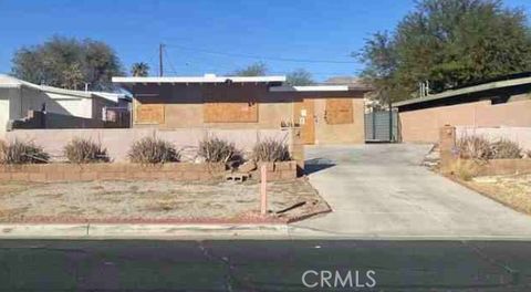 Photo of 66022 Desert View Ave, Desert Hot Springs, CA 92240 (MLS # IV26000606)