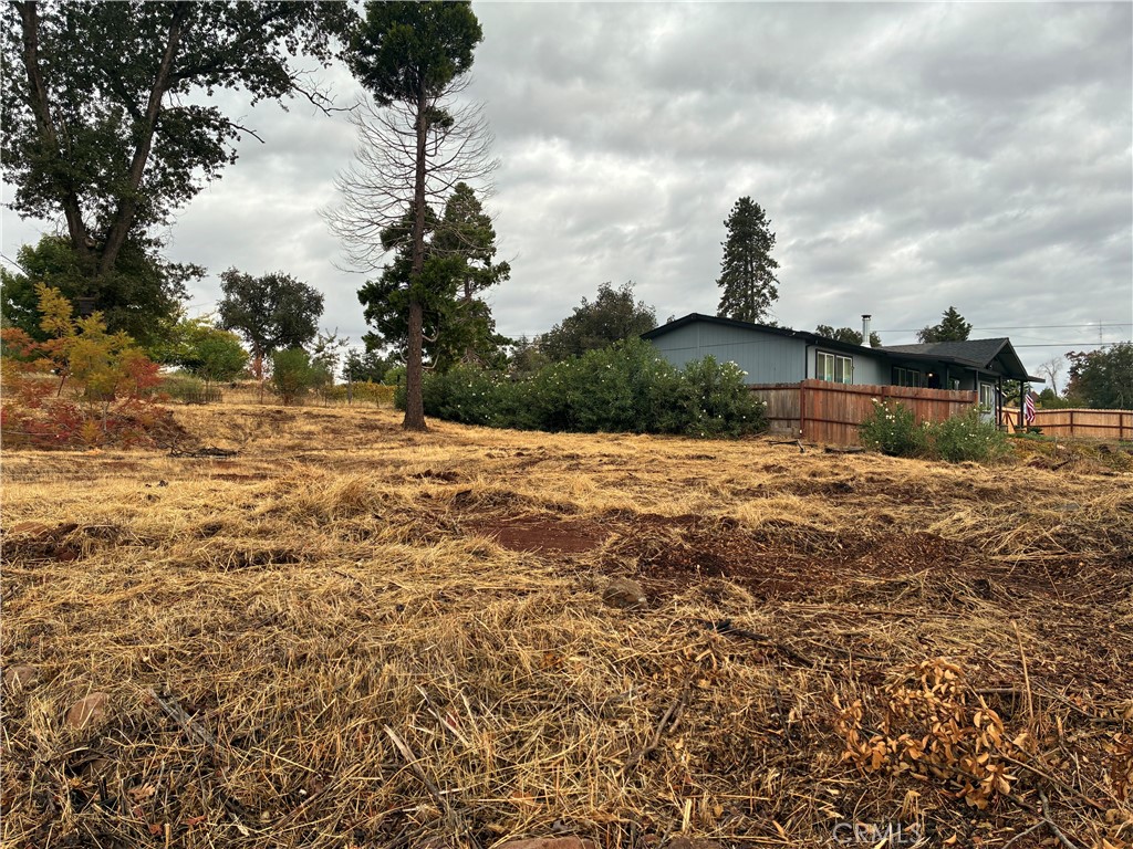 Nestled in lower Paradise, this spacious .53 acre lot offers an excellent opportunity to build your dream home. The property previously had a 2 bedroom residence, giving you a head start with utilities and layout possibilities. A standout benefit: the seller is covering the cost of the water connection, saving you thousands of dollars compared to a reconnection fee. With plenty of room for a home, garden, or additional outdoor living space, this lot combines affordability with convenience. Don’t miss out!