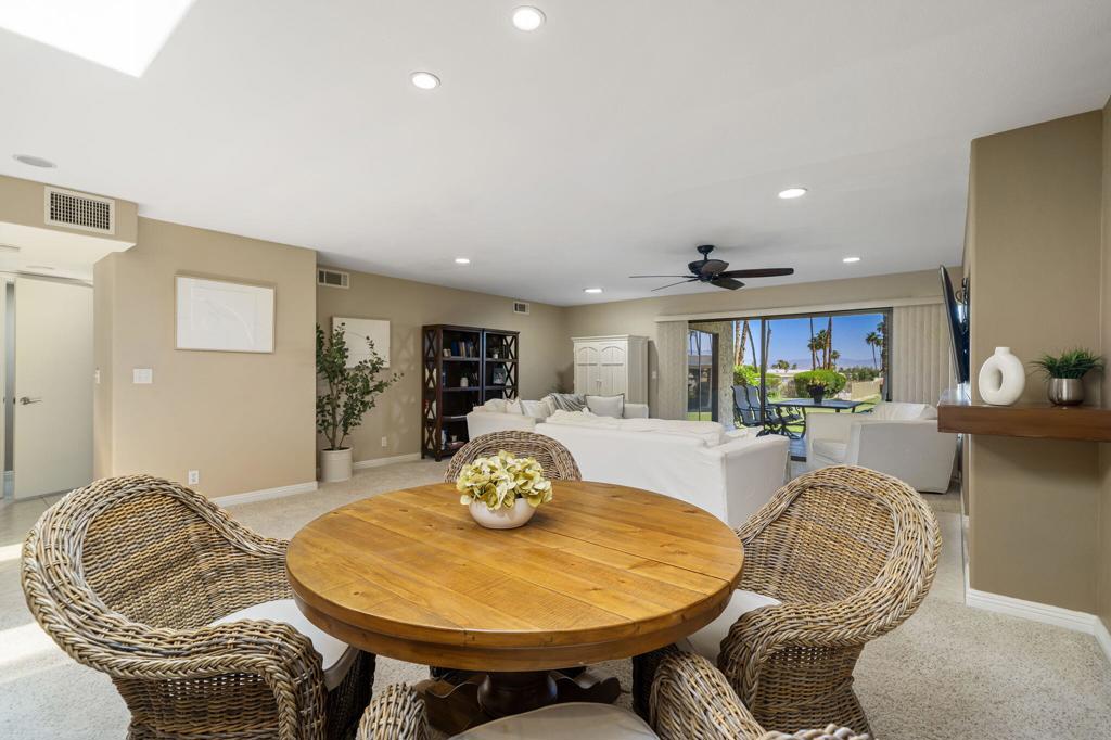 Discover this wonderful single-level home in the beautiful hills of South Palm Desert! Located in a charming, gated community of just 100 residences, this property offers an ideal setting for an active lifestyle complemented by stunning mountain views and is currently the LOWEST-PRICED condo of its size in the area.This spacious 1,637 sq ft home features two large bedrooms and three bathrooms (two full, one half). The popular great room flows effortlessly into a sizable living area that opens to a back patio, providing spectacular views of Eisenhower Mountain. The expansive primary bedroom suite includes a walk-in closet, a comfortable sitting area, and an en-suite bathroom with a shower-tub combination.The kitchen is well-appointed with stainless steel appliances, stylish granite countertops, a large peninsula perfect for entertaining, and plenty of cabinet space.Residents of this community enjoy access to the Palm Desert Tennis Club, a vibrant social hub offering eight lighted tennis courts, pickle ball, an indoor squash court, a bocce ball area, a main 60-ft heated lap pool, and a pool/spa in each quad. The HOA dues cover comprehensive tennis programs, an on-site tennis professional during the season, a fitness center, Wi-Fi, and basic cable. Please be aware that the clubhouse is being remodeled and is expected to be completed for the 2026 season.