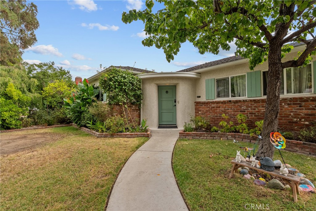 Welcome to 924 N Niagara Street — a warm and inviting home tucked away on a peaceful, tree-lined street in the heart of Burbank. This versatile property features a single story spacious main house with 3 bedrooms and 3 bathrooms. Inside, you’ll find beautiful hardwood floors, updated bathrooms and kitchen, indoor laundry, and thoughtful details throughout and paid off solar system. Plus a detached ADU with vaulted ceilings, a full kitchen, bathroom, and endless possibilities. It’s perfect for a home office, in-law suite, rental unit, or creative space.
Step outside into your private backyard retreat — complete with a sparkling pool, built-in BBQ, cozy lounge area, and string lights that set the perfect mood for family gatherings or quiet evenings under the stars. Whether you’re looking for a place to plant roots, host loved ones, or invest for the future, this Burbank gem truly offers it all.