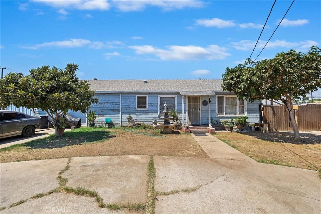 Stop the car! This charming home in the La Sierra Acres is ready for either living or opening a business, as it is zoned for Commercial Use as well. This home has a large lot and has 2 bedrooms and 1 full bath. Currently, the home has the garage set up as a 3rd bedroom. Walk in and land in the living room. To the left you will walk into the galley kitchen that has direct entry into the garage. From the living room, go down the hall and find two large bedrooms located on each side of the bathroom. The bathroom features a shower/tub combo and has been upgraded. Through the garage, it leads you to the huge backyard that has a stand alone shed and also has horse stables to house a few animals. The potential in this home is endless. You could add onto the property or create a business you run through your home. Creativity is the name of this purchase. Close to the 91/60 freeways, churches, schools, golf and plenty of shopping. Priced to sell! Thank you for your interest!